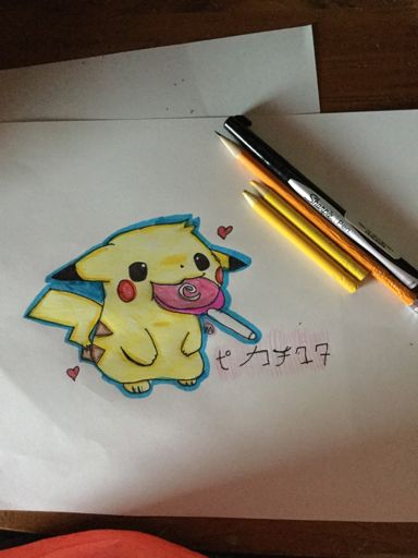 pikachu with a lollipop