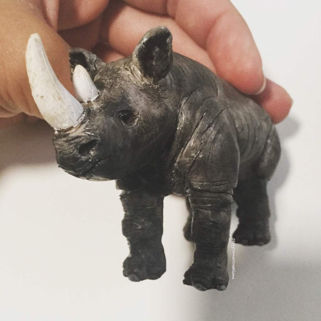 white rhino figurine