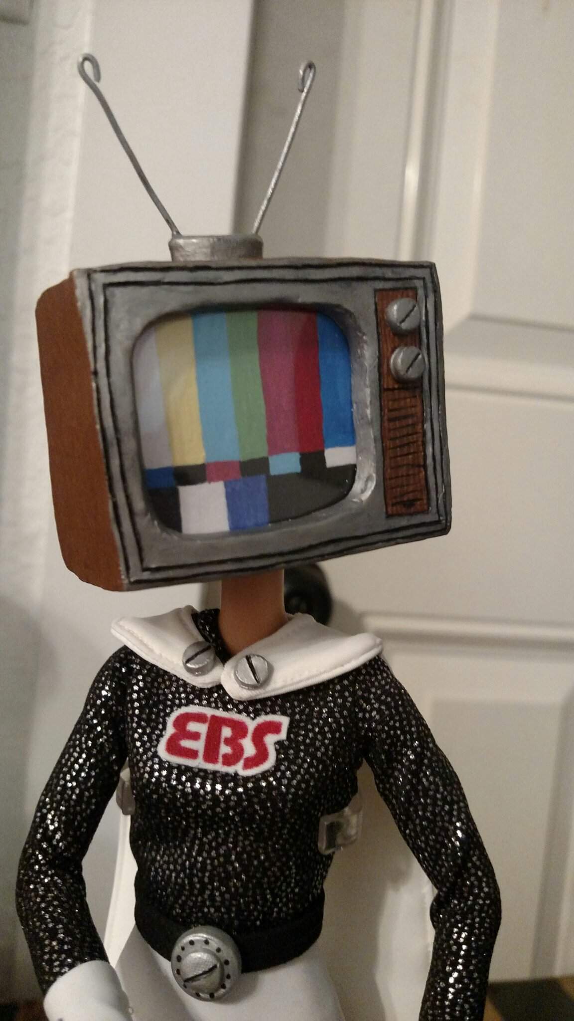 tv head doll