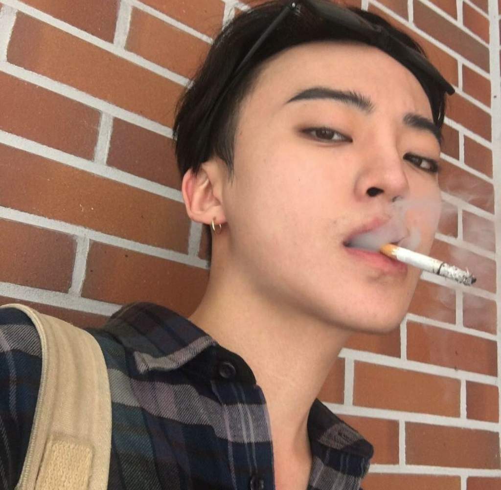 Asian boy smoking