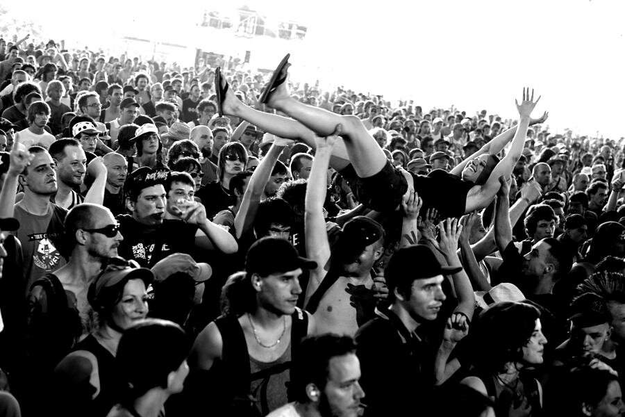 Naked crowd surfing