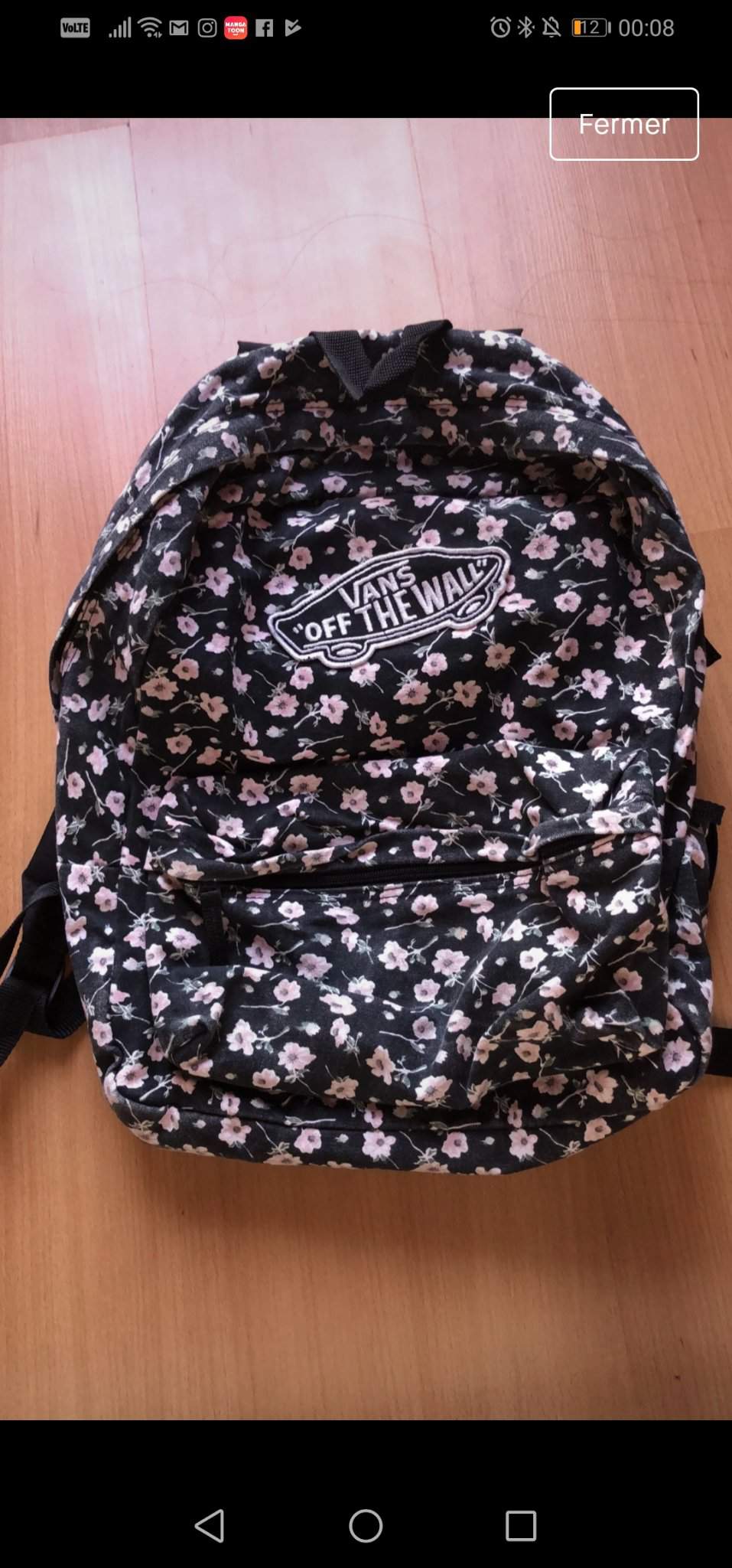 Is this bag (first photo) a fake vans 