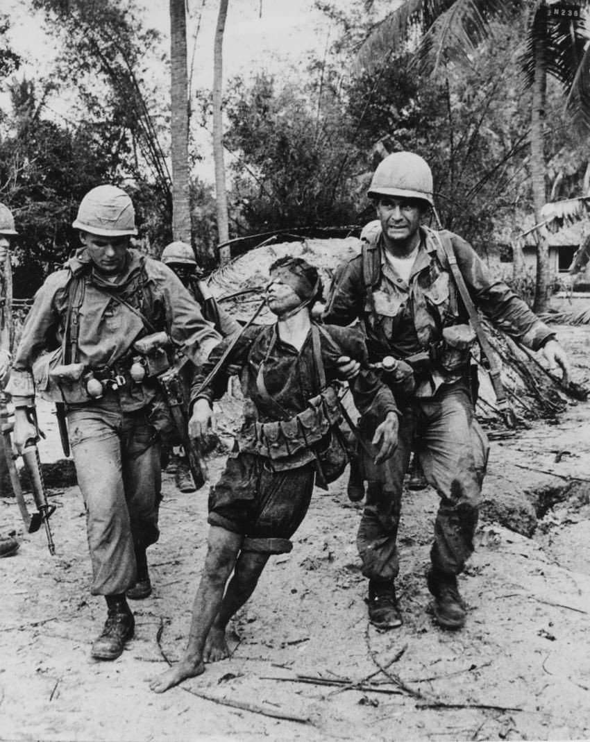 viet-cong-getting-dragged-way-battlefield-amino-amino