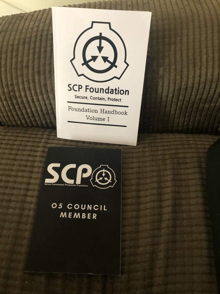 Two SCP Foundation book that I have SCP Foundation Amino