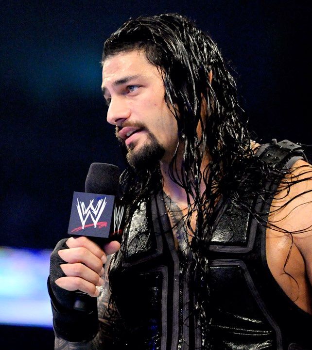 Resultado de imagem para roman reigns with microphone