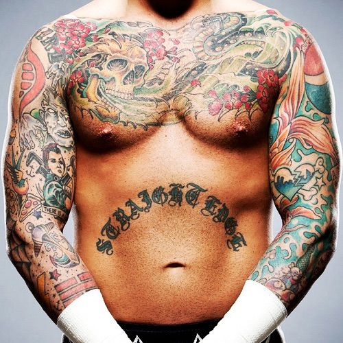 2. CM PUNK has the best chest tattoo.