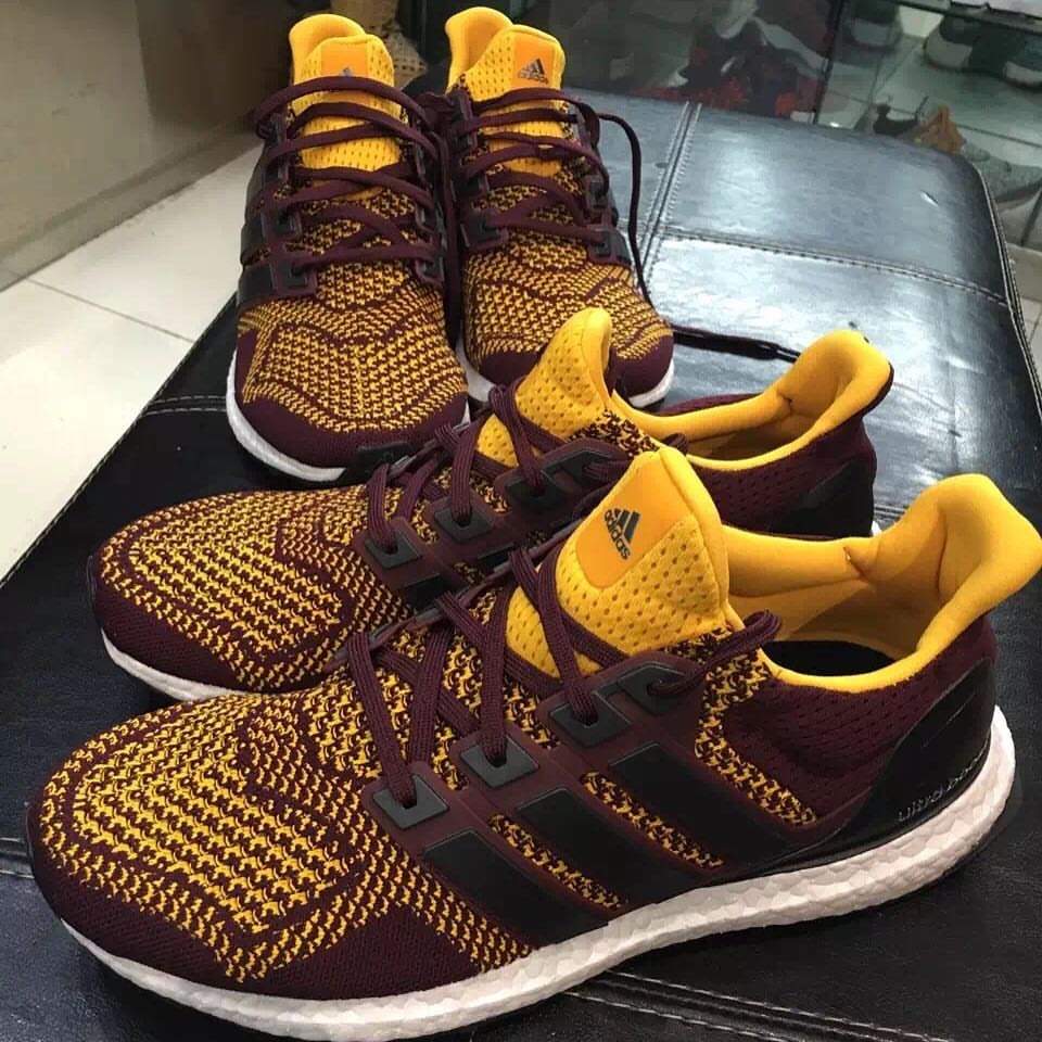 burgundy and yellow sneakers