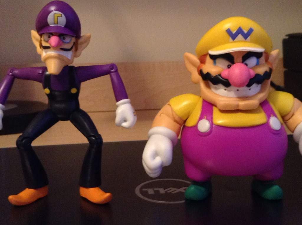 wario and waluigi plushies