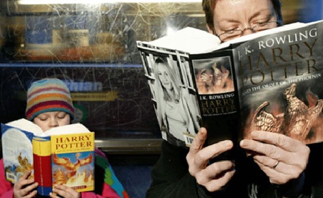 Image result for person reading harry potter book