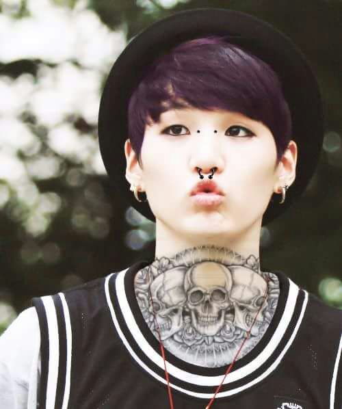 Which member of BTS looks best with tattoos/piercings? K