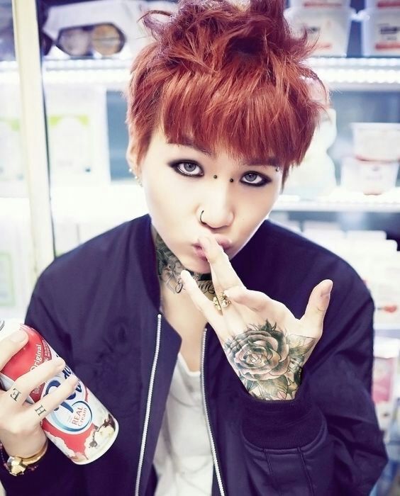 Which member of BTS looks best with tattoos/piercings? K