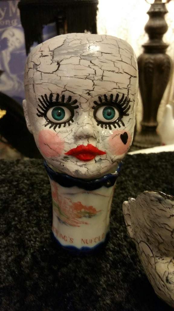 creepy doll head