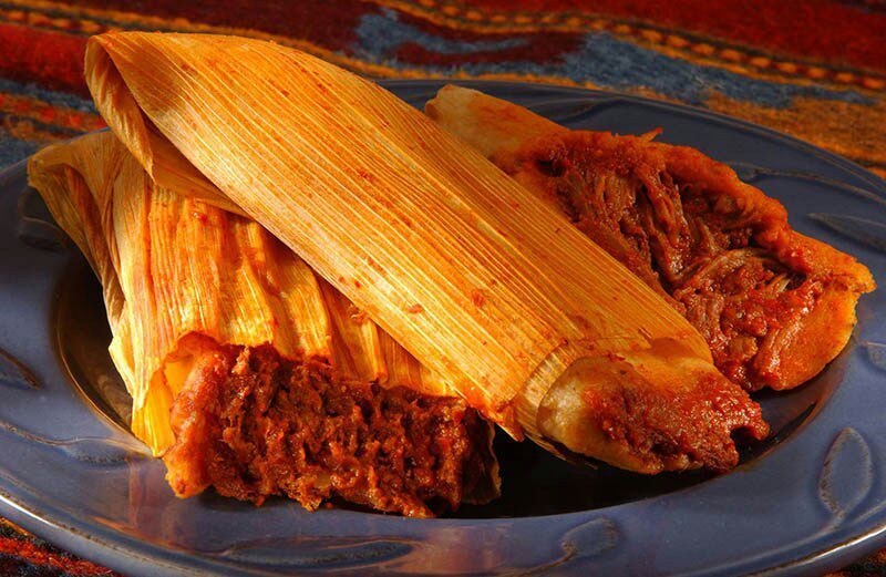 Tamales: Mexican dish made with corn dough, stuffed with meat (beef, chiken...