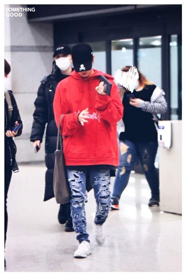 red hoodie blue jeans