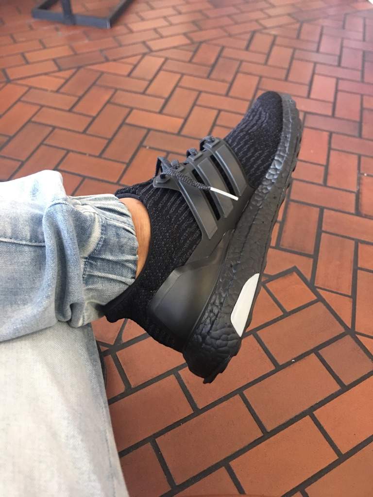 ultra boost triple black on feet