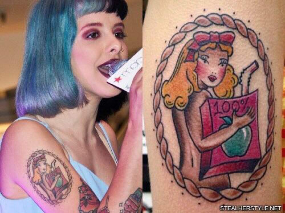 Melanie Martinez has a tattoo on her upper right arm of a retro pin-up girl...