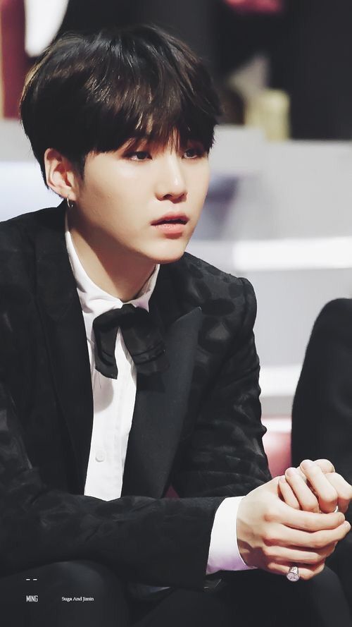 suga in black shirt