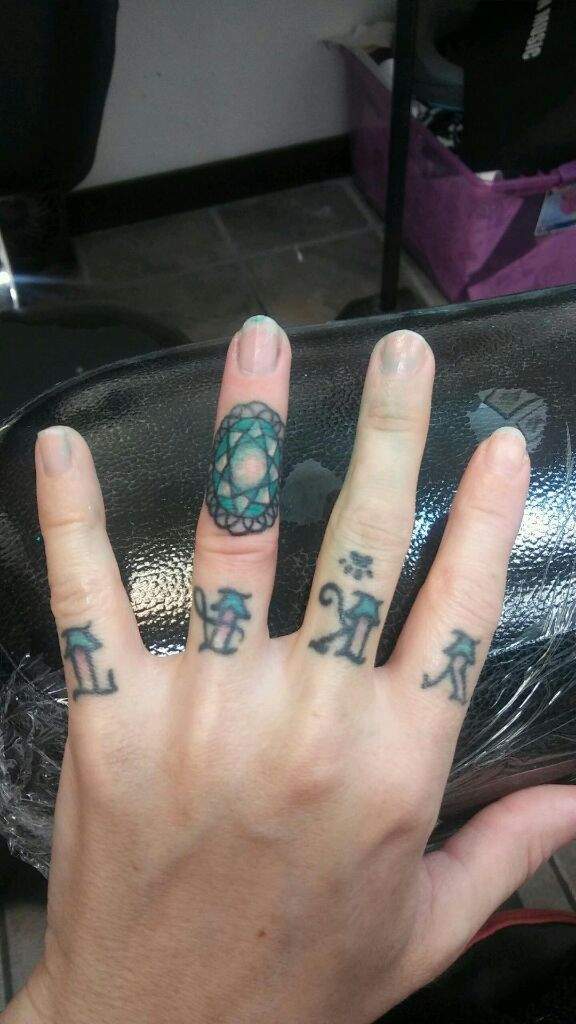 Some symbols on Nathins hand  Dollys Skin Art Tattoo Kamloops BC