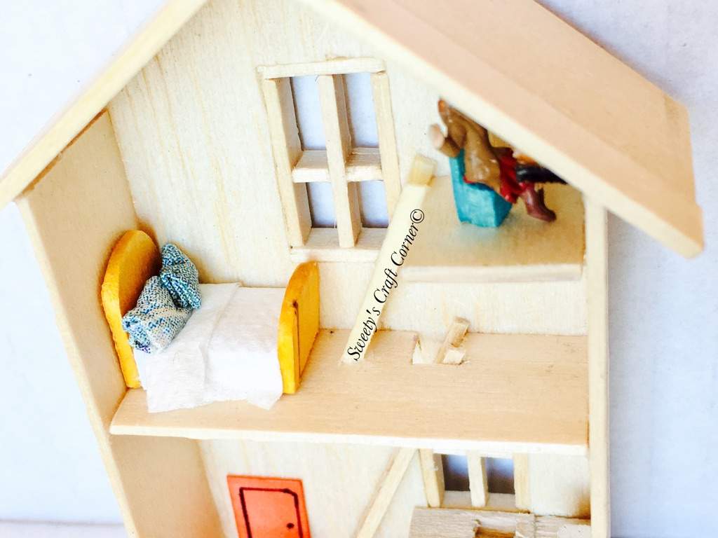 balsa wood dollhouse