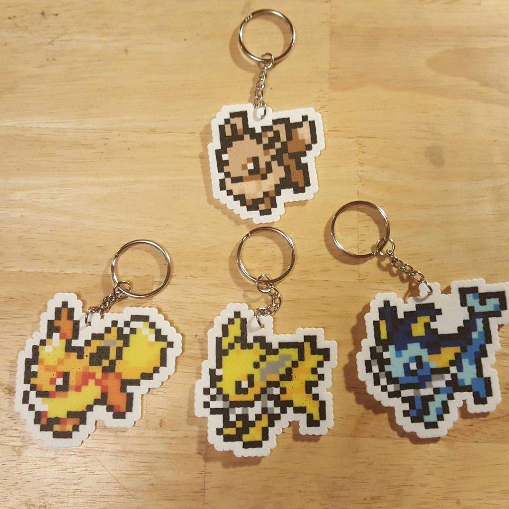 Perler Bead Eevee and the Eevelutions Keychains | Pokémon Amino