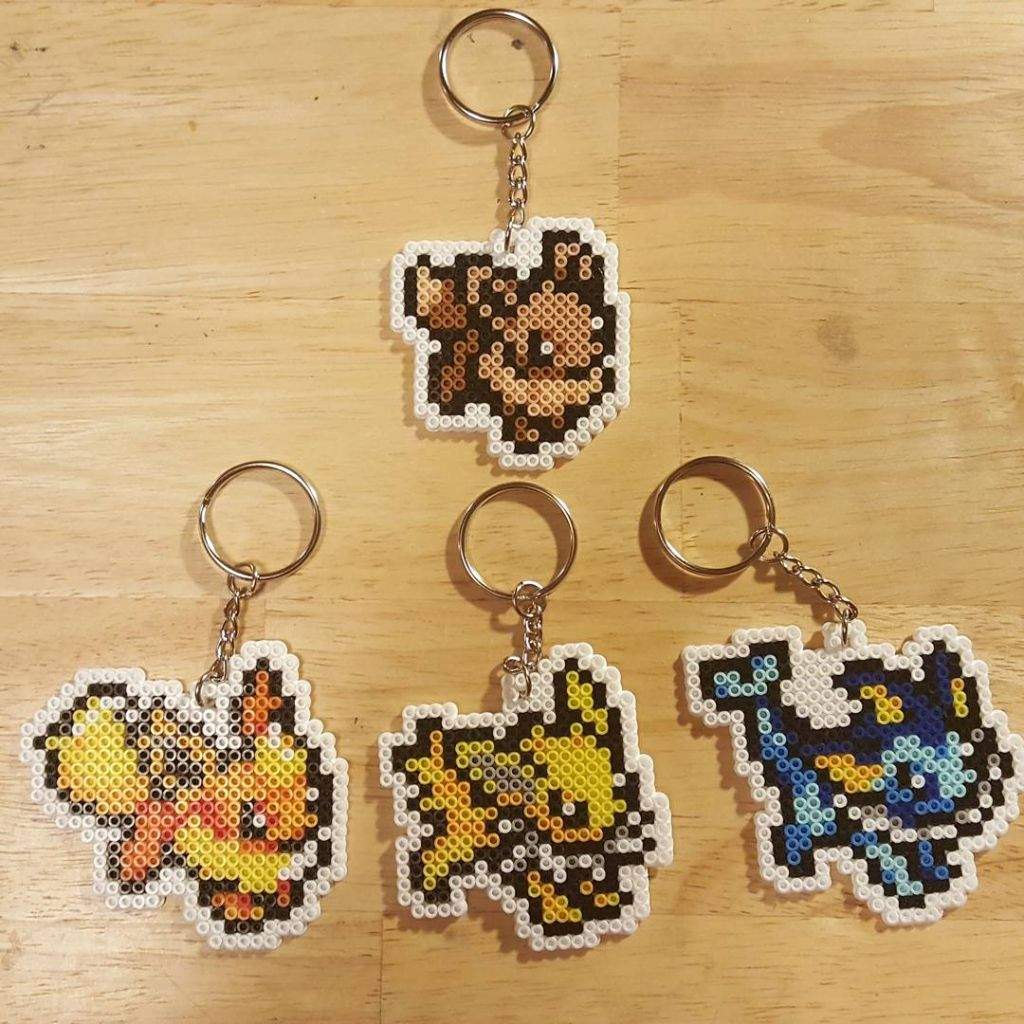 Perler Bead Eevee and the Eevelutions Keychains | Pokémon Amino