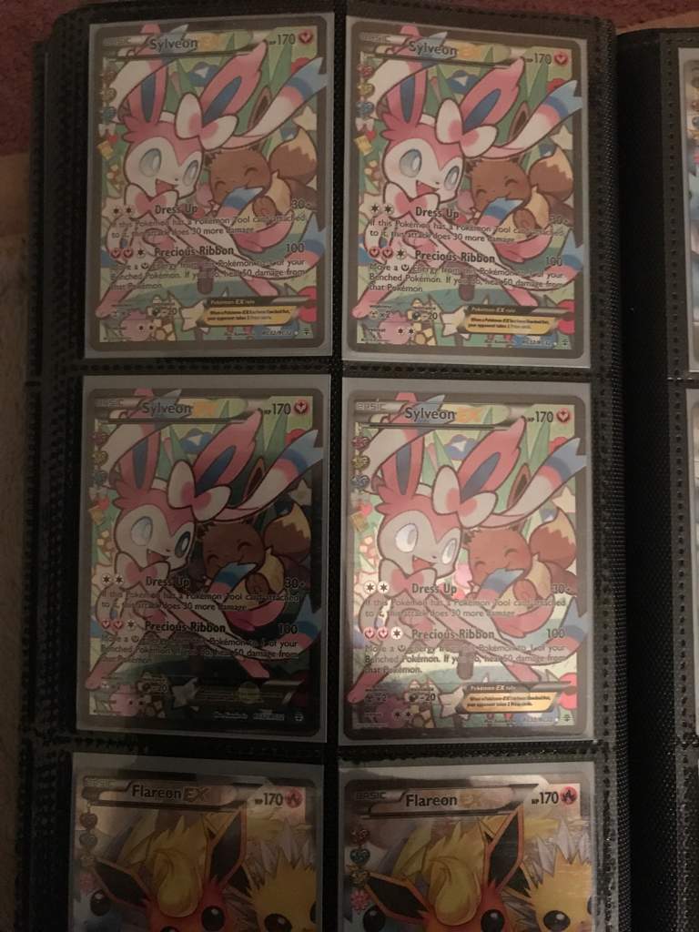 The amount of sylveon cards in my binder pok mon trading card game 