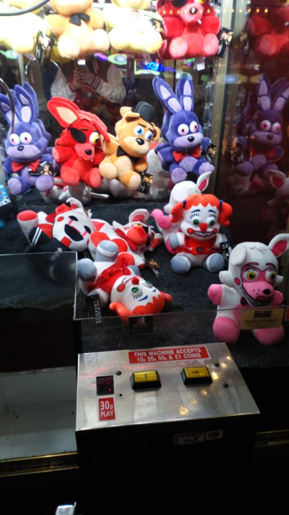 Five Nights At Freddy s stuffed dudes in the claw machine at  