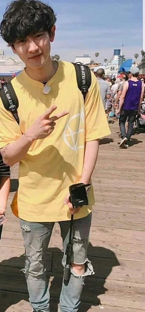 yellow top with blue jeans