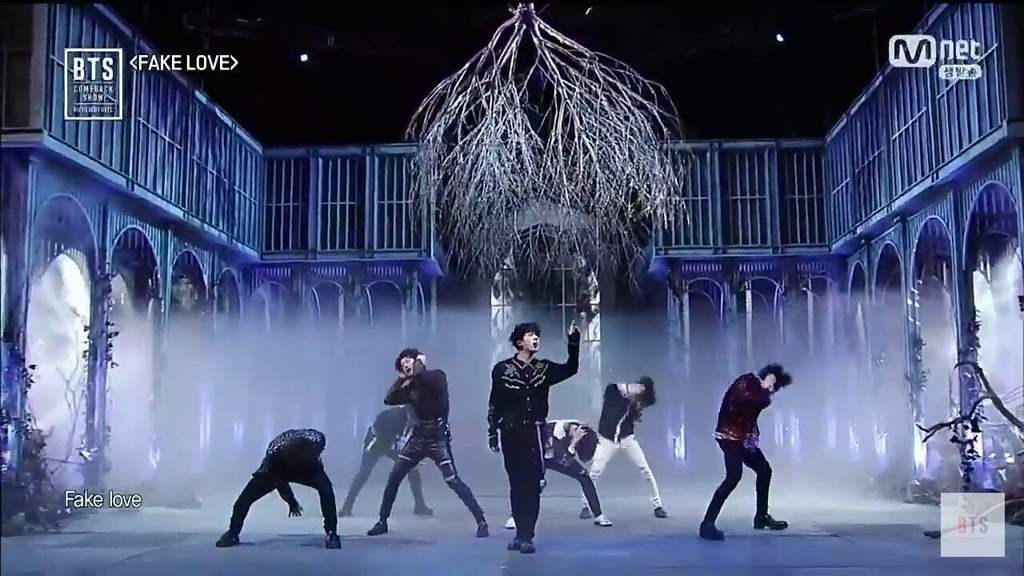 Песня fake love. BTS fake Love фото камбэк. БТС фейк лав силуэты. BTS fake Love Stage. BTS fake Love in Raincoats.