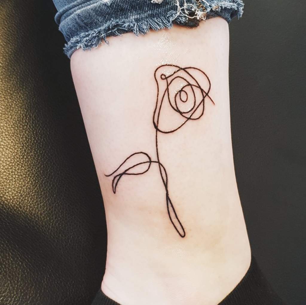 Love Yourself flower tattoo.