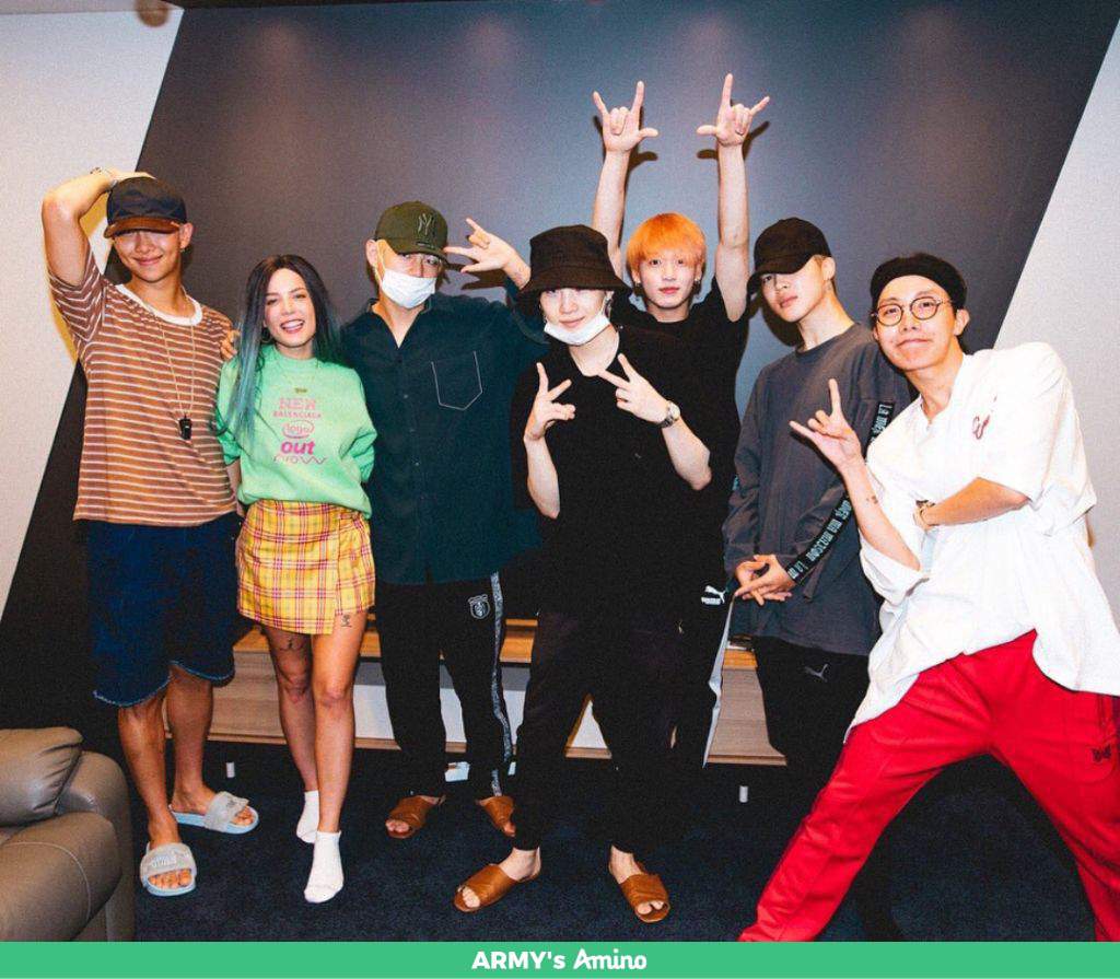 Jungkook has orange hair!!! The rest of the members are wearing hats to  cover up their new hair colors too!!! Jin is missing tho | ARMY's Amino