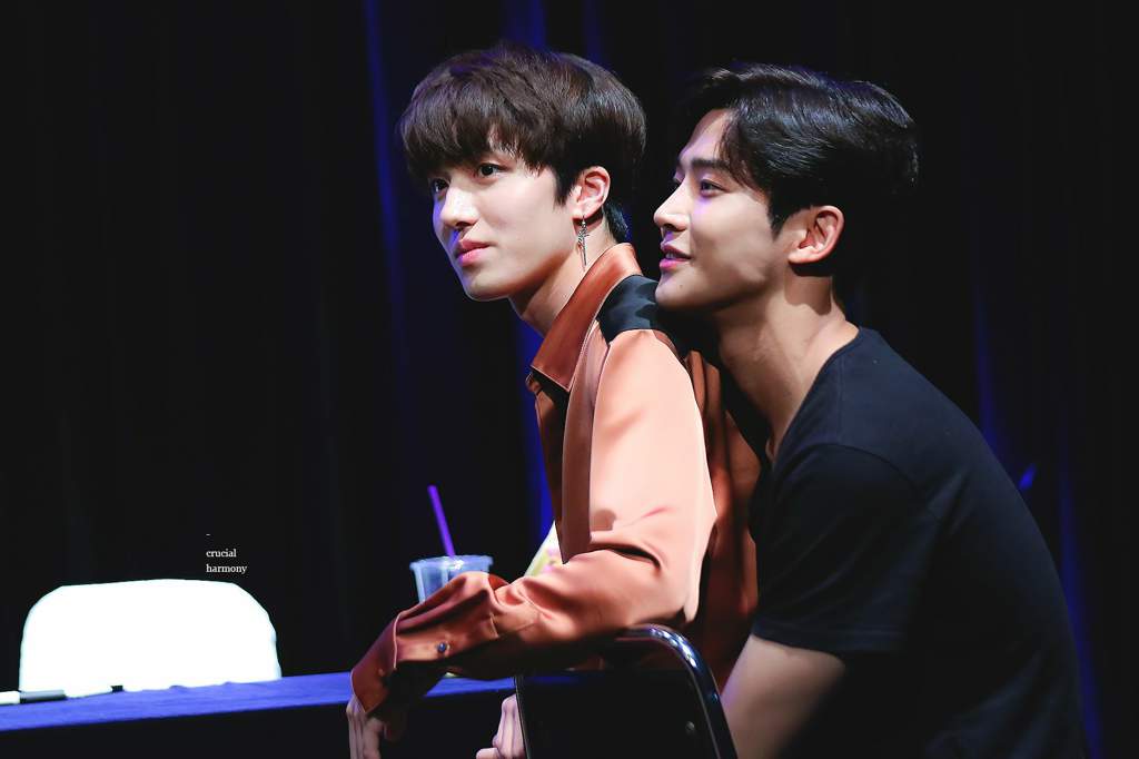 rowoon somehow got chani to sit on his lap. 