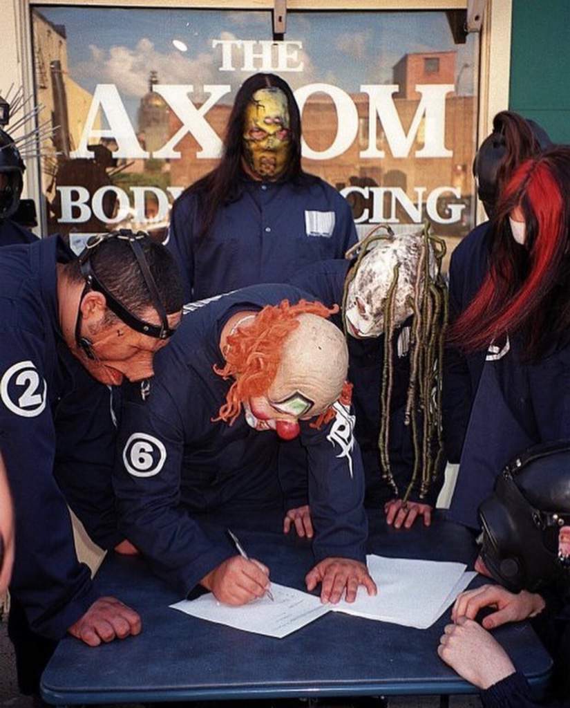 Slipknot rare photo of record deal signing | Slipknot Amino