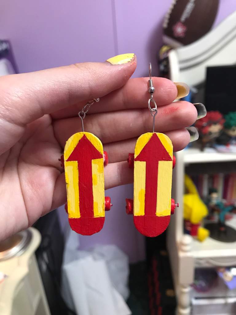 killua skateboard earrings