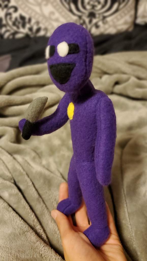 purple man plush